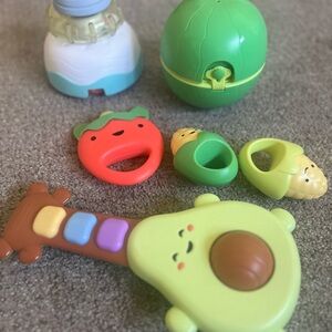 Skip Hop Musical Avocado and Friends Toy Set - Green, Brown, Red